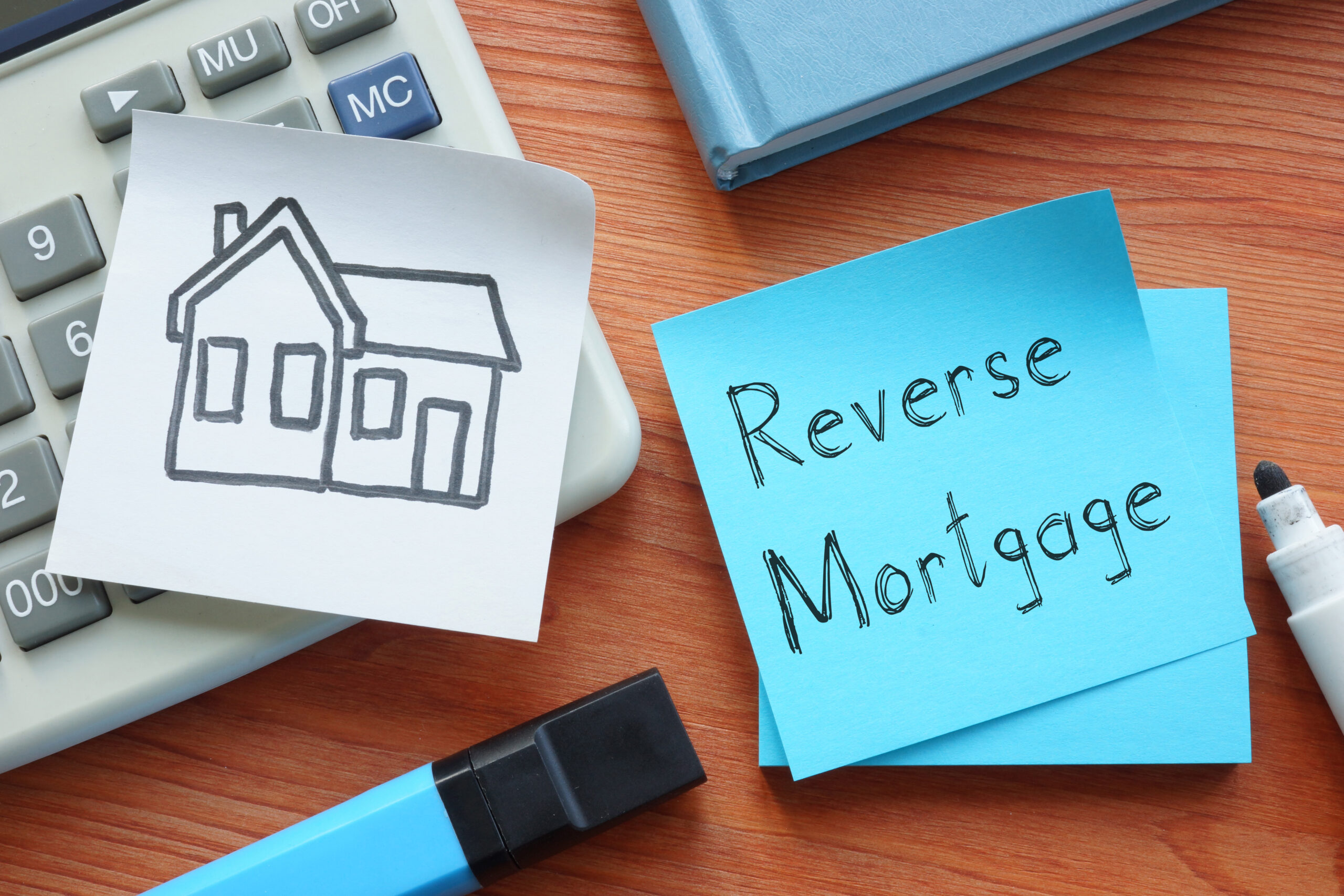 Reverse,Mortgage,Is,Shown,On,A,Business,Photo,Using,The